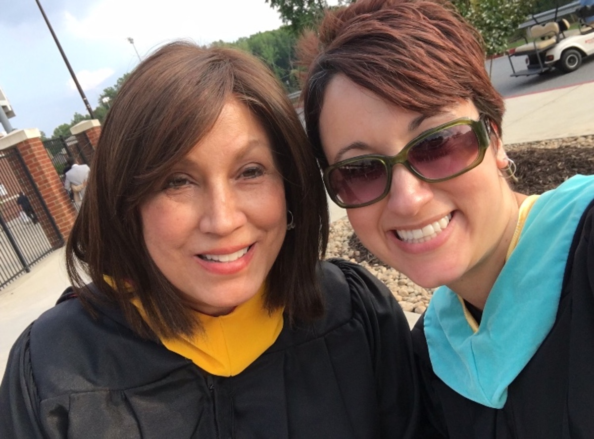 Yarbrough+%28left%29+with++fellow+math+teacher+Nikki+Snyder+%28right%29+at+last+year%27s+graduation+ceremony.
