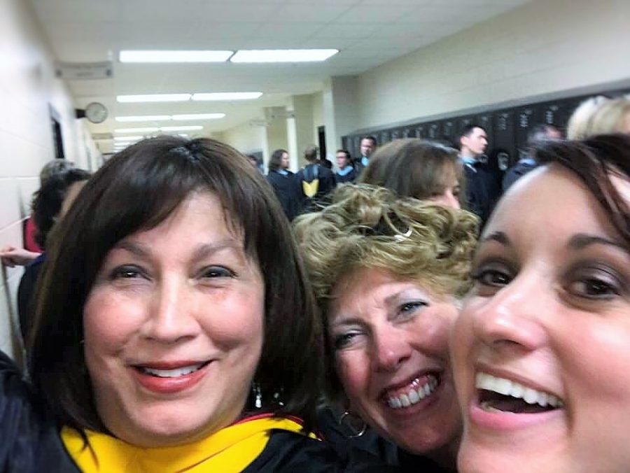 Yarbrough (left) at last years graduation ceremony, with fellow math teachers Tamra Jeffery (center) and Nikki Snyder (right).