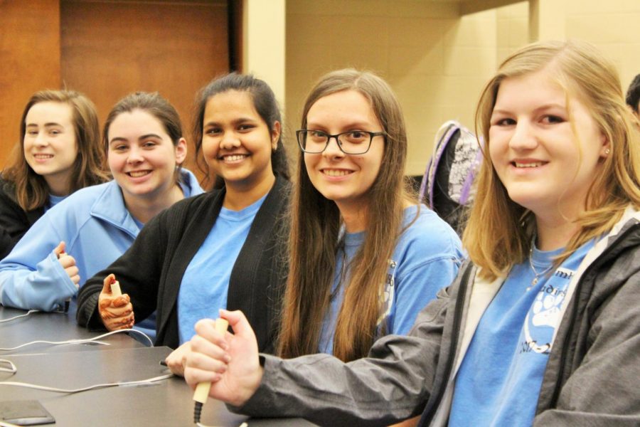 Reading Bowl members  posing for a quick picture before buzzing in from left to right: Freshman Katie Krzanich, Juniors Katie Leffler and Kirti Muthyala, and Sophomores Rylee Ovrevik and Carolyn Collins