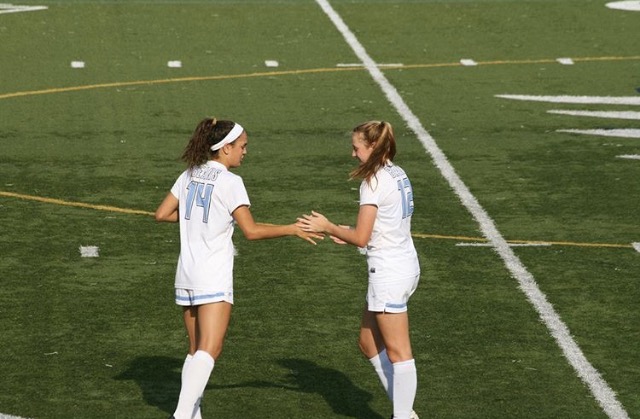 Current seniors Charlotte Teeter and Leigh Hamblin during a 2017 season home game. Both players are now at DA.