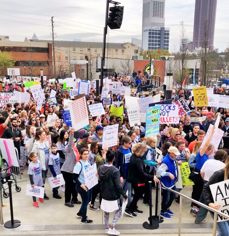 Protesters at the March for our Lives, many of whom are holding signs in support of the movement.