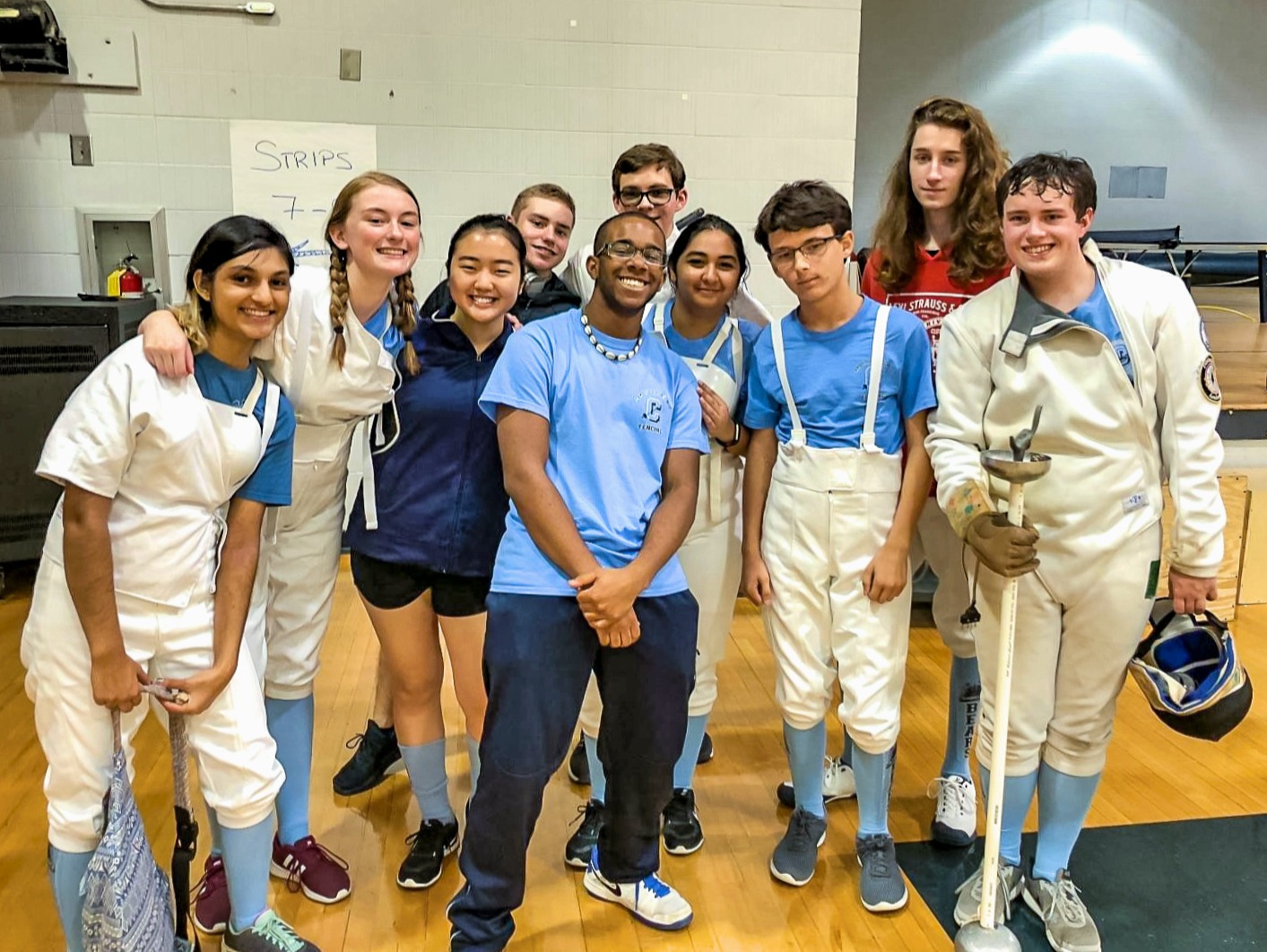 Members of the Cambridge fencing team at the Dunwoody High School tournament.