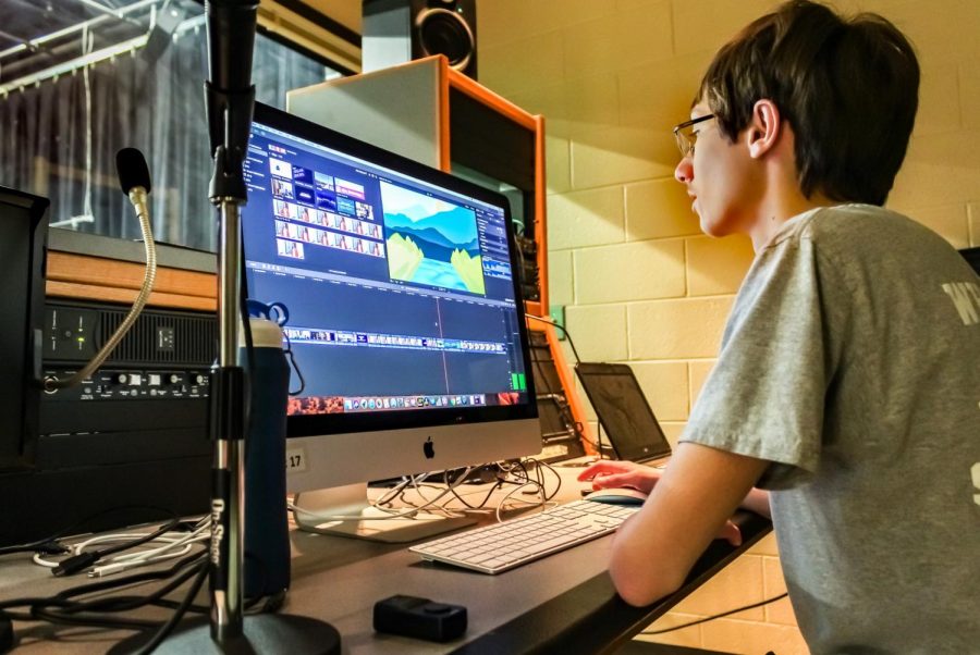 Executive producer Jason Scerno putting together the final edit of the schools morning program, The Bridge.