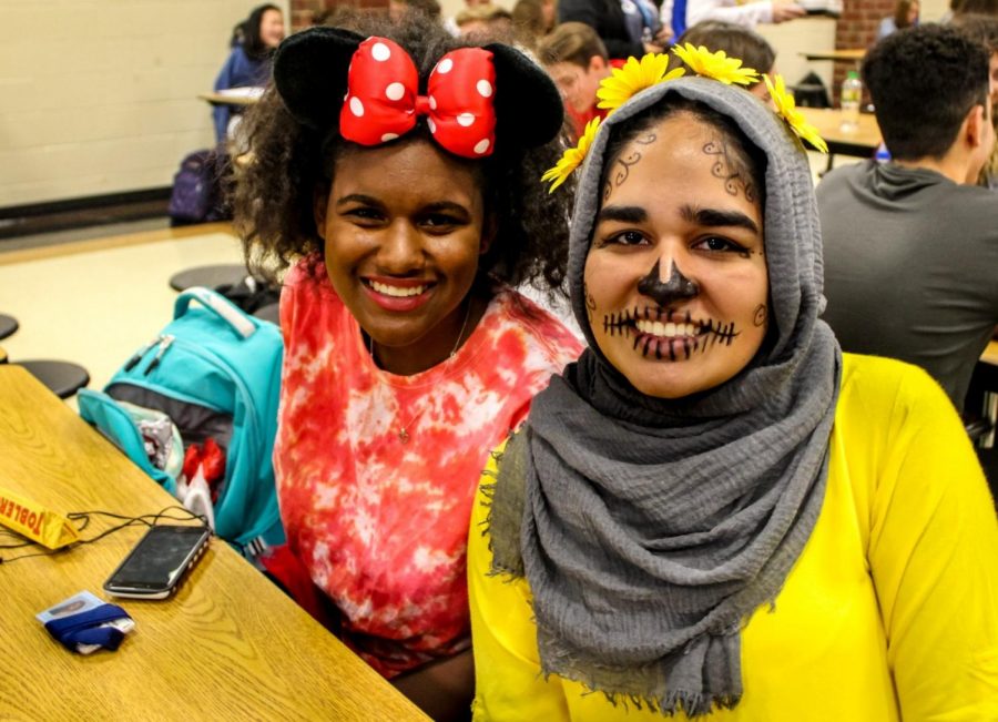 Cambridge students did not disappoint in showing their Halloween pride.  Picture here are junior Kimberly Poinsette as Minnie Mouse and junior Duaa Tariq as a Coco Skeleton.     