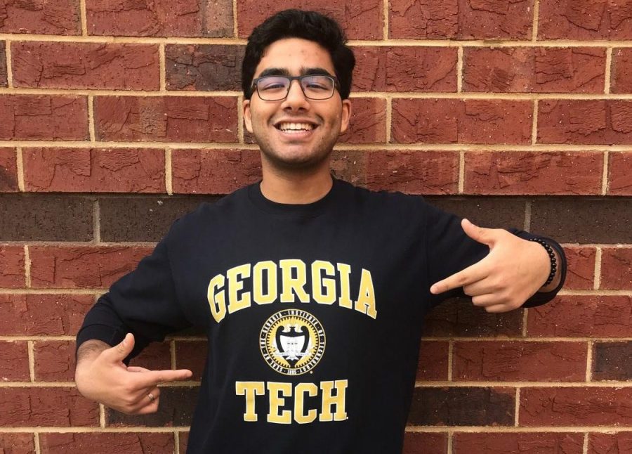 Senior+Nishu+Pawar+shows+off+his+Georgia+Tech+sweatshirt.