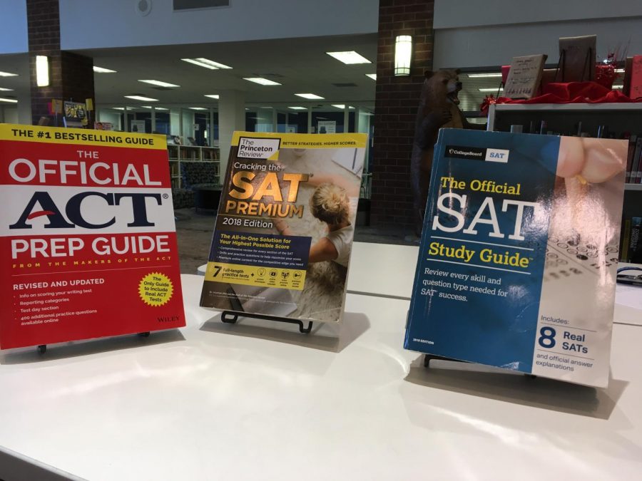 Several+prep+books+for+the+SAT+and+ACT.++Study+books+like+these+offer+less+expensive+alternatives+to+tutoring.