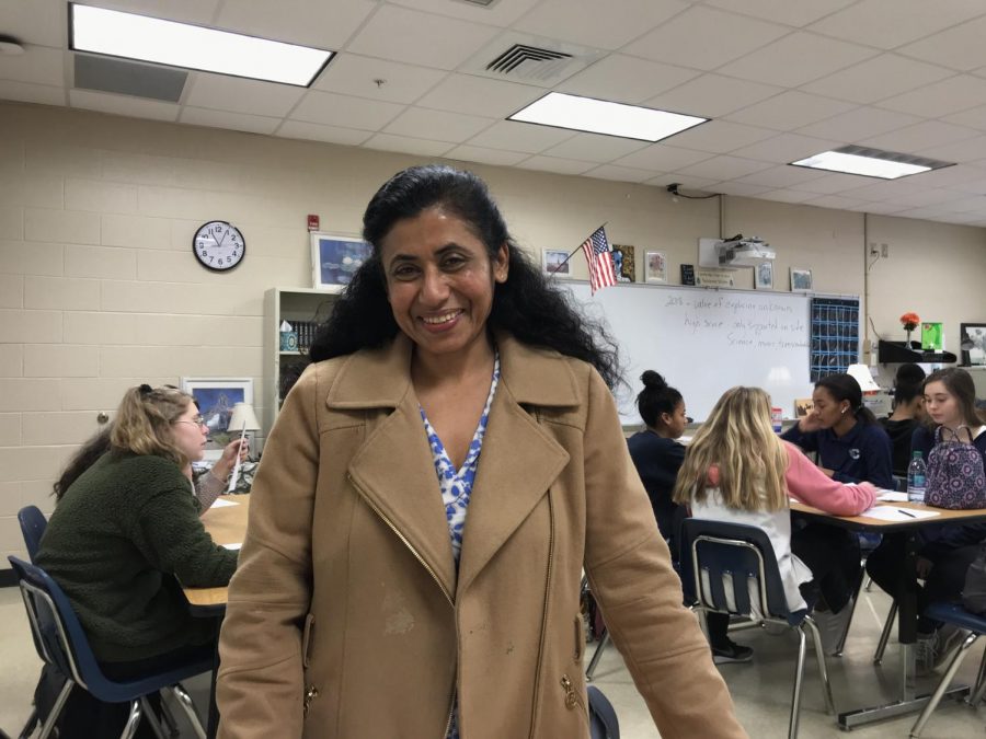 Reeta Ahuja, better known to students as Ms. A, flashing her signature smile.