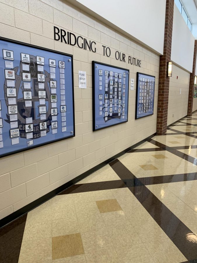 This series of bulletin boards, which is featured prominently at the front of the school, displays where the graduating class of seniors will be attending college in the fall.