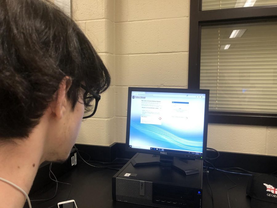 Senior Luka Gvenetadze demonstrates logging into Fulton Virtual.