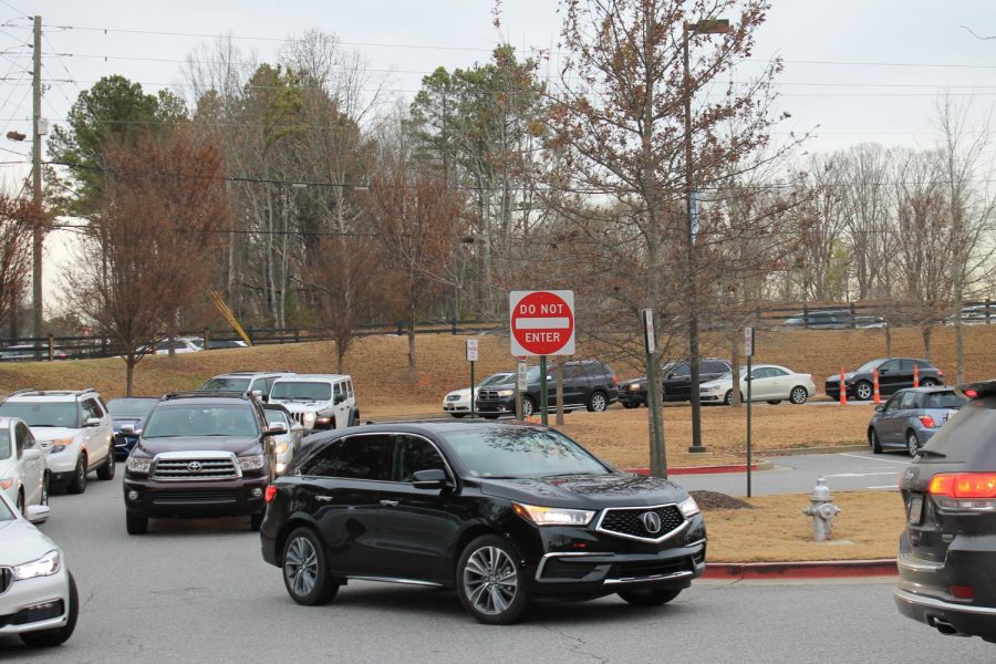 The schools parking lot after school. Car use is one of the biggest contributors to climate change.