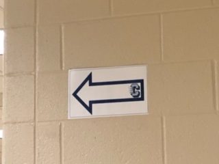 Blue arrows guide students paths throughout the halls.