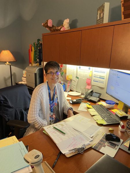 Ellison at her desk in her office.